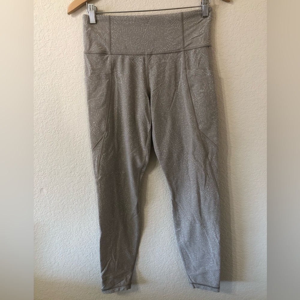 Athleta Salutation Stash Pocket Tight in Quail Tan Beige - Size Medium